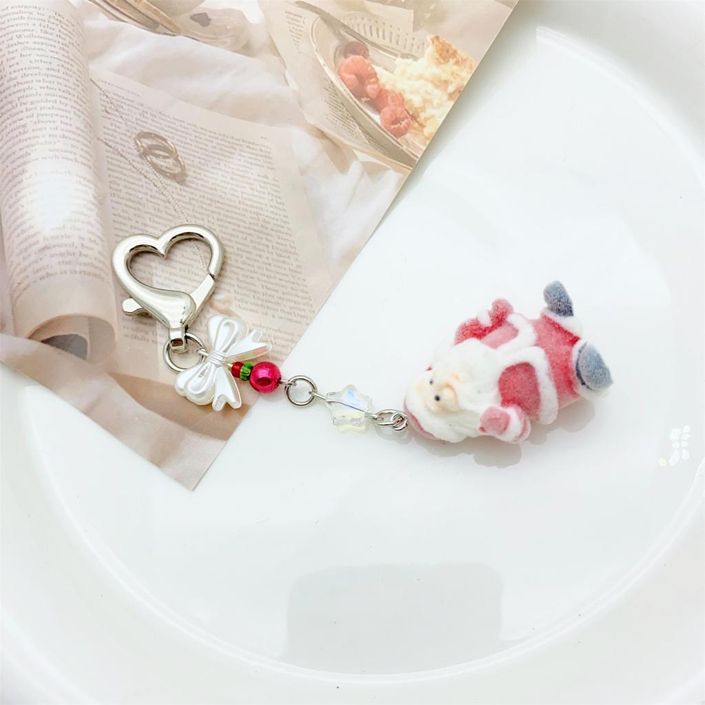 Fashionable Christmas Santa Claus Flocking Keychain With Star Bowknot Soft Plush Charm Accessory for Bags and Phones