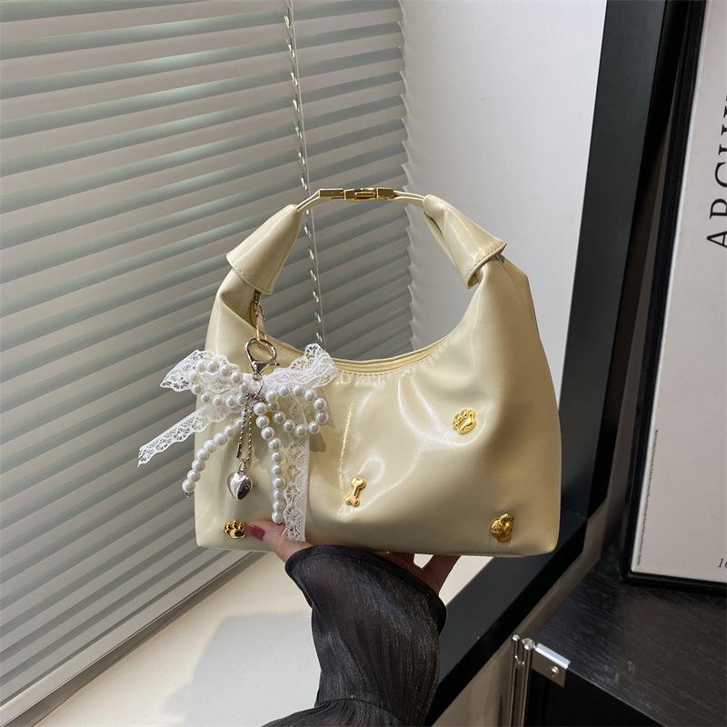 

New women s bags are fashionable and beautiful, personalized and fashionable niche handbags, shoulder and underarm messenger bags. no pendant жёлтый