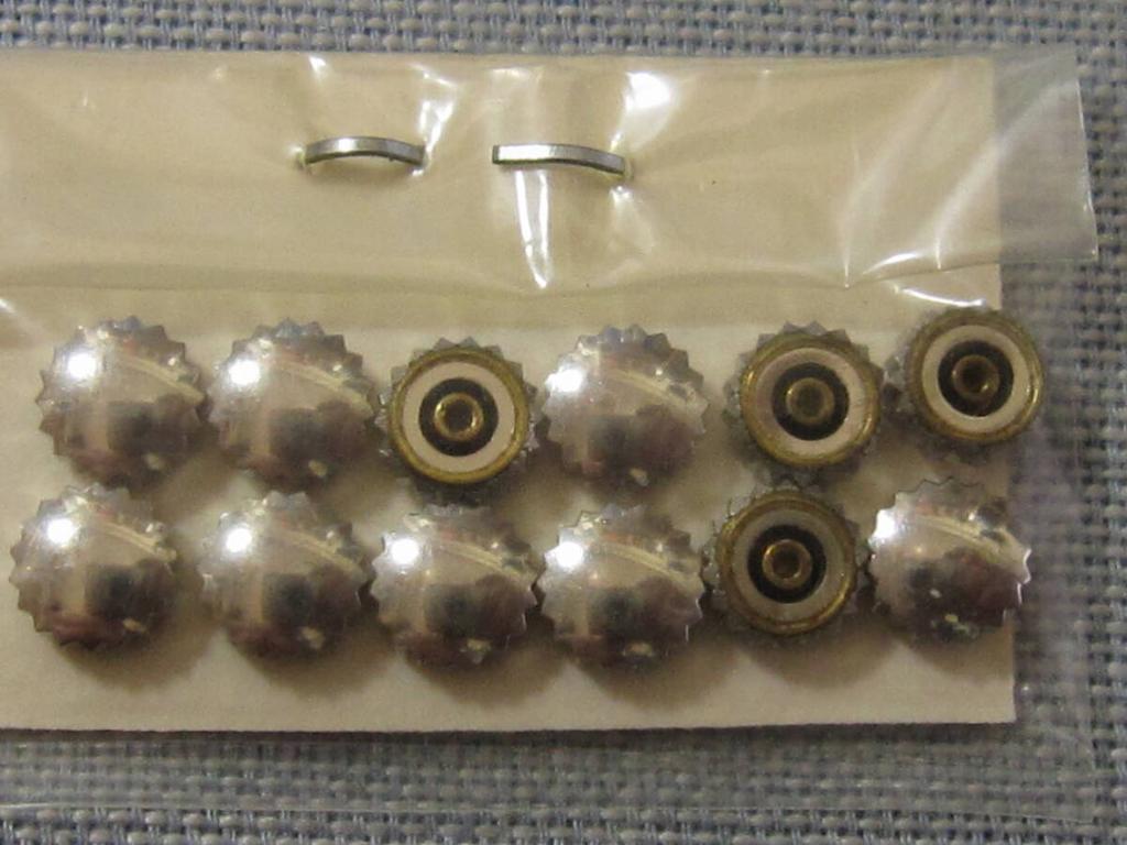 CITIZEN Part C One dozen silver crowns for Ace 435 watches.