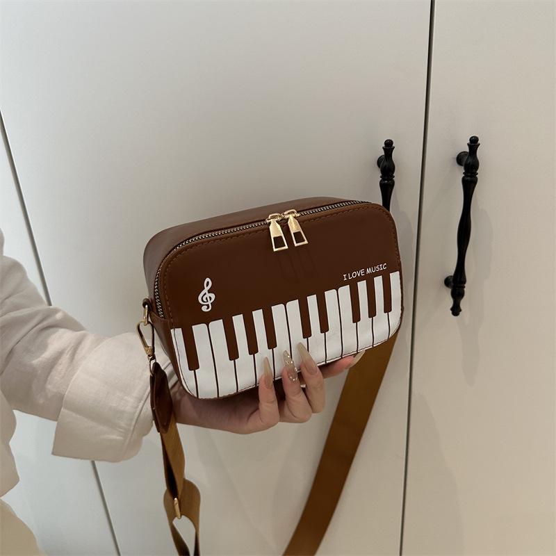2025 nowa torba na pianino modna kontrastowa mała kwadratowa torebka damska słodka nuta muzyczna mała listonoszka przenośna torba damska
