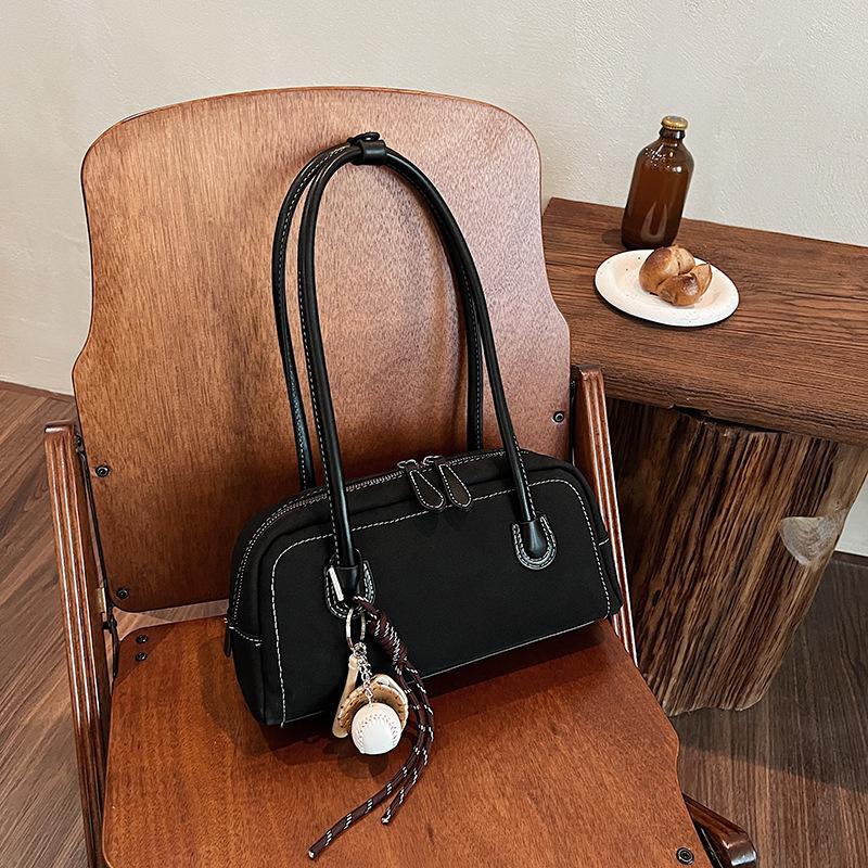 Niche retro underarm bag women's 2025 new autumn shoulder bag large capacity commuter Boston pillow bag
