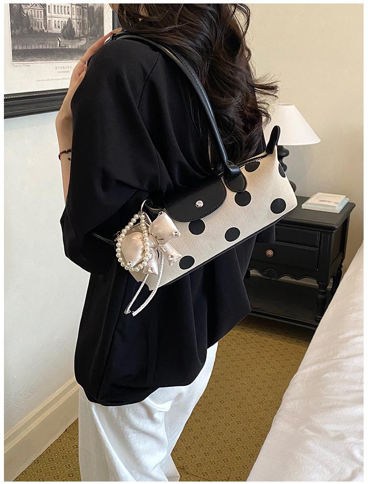 2026 French Light Luxury Cowhide Long Handle Dumpling Baguette Crossbody Bag