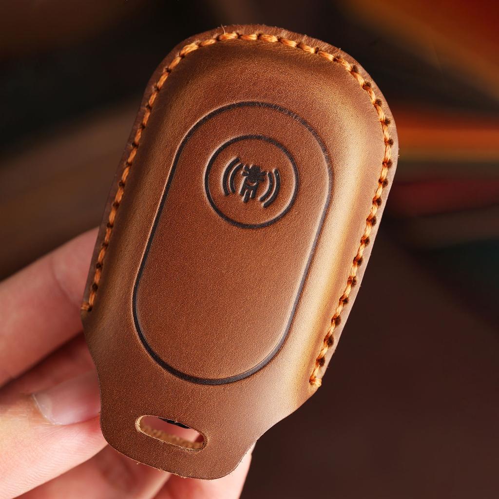 Leather key cover is suitable for Sanyang SYM motorcycle remote control key protection bag, genuine leather is purely handmade and retro.
