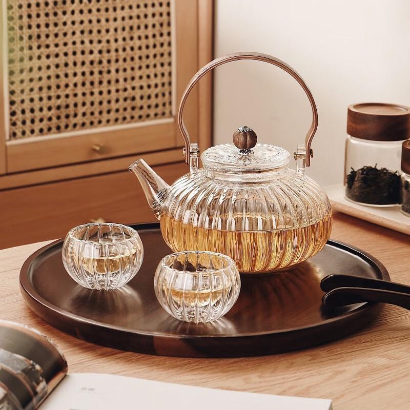 Pumpkin-Shaped High-Temperature Resistant Glass Teapot with Handle for Stove and Electric Ceramic Stove Heating.