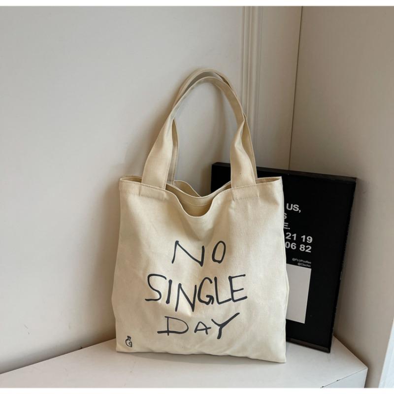 

Casual large-capacity canvas bag women s new commuter versatile shoulder bag college student class bag tote bag