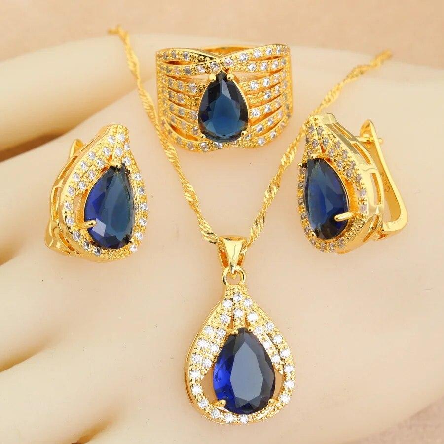 

Новинка 2024 года для женщин, комплекты свадебных украшений с покрытием из 18-каратного золота, серьги с каплями воды и кристаллами, ожерелье, кулон, кольцо, свадебный подарок 10 синий