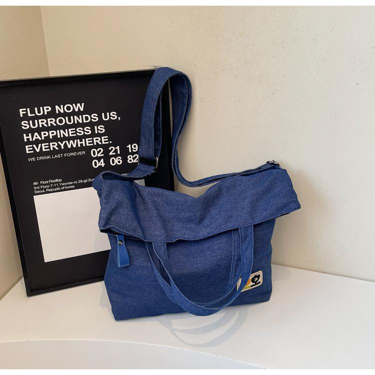 

2025 spring women s new large-capacity handbag portable short-distance business trip versatile commuter niche travel bag темно-синий