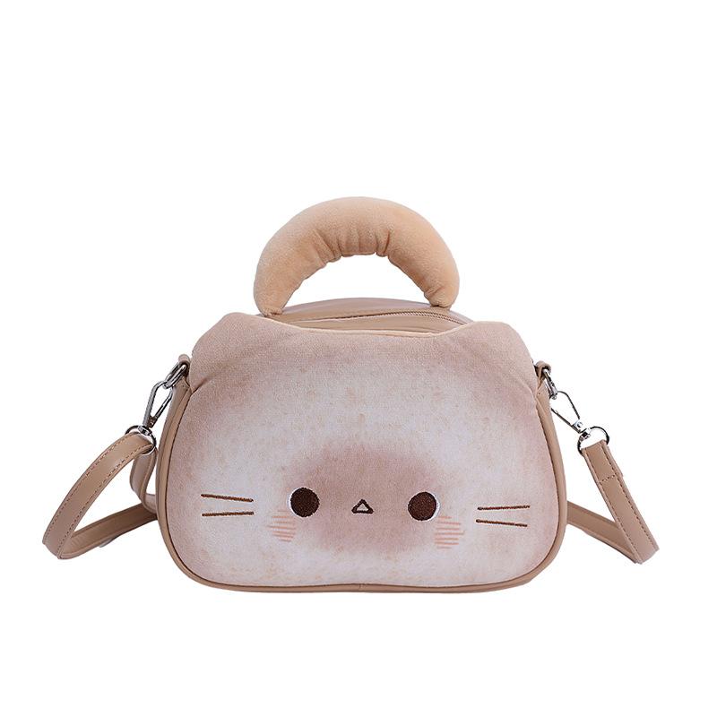 Internet celebrity cute biscuits kitten bag 2025 new Japanese cartoon girl foreign versatile messenger small round bag tide