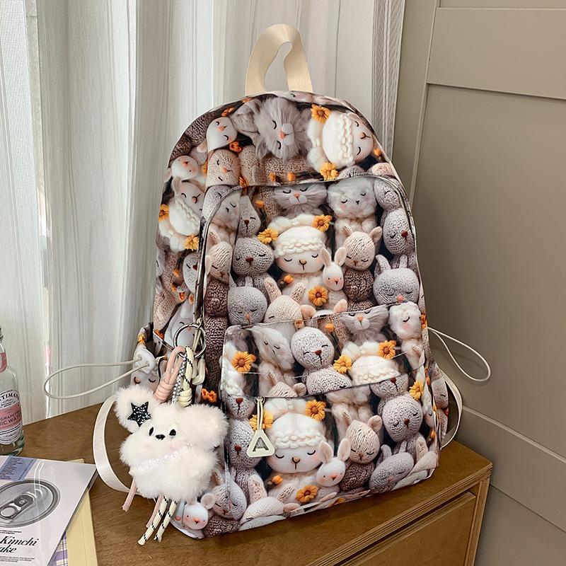 High value, fresh, sweet and cute printed backpack, lightweight make-up class for junior high school students, and large-capacity backpack.