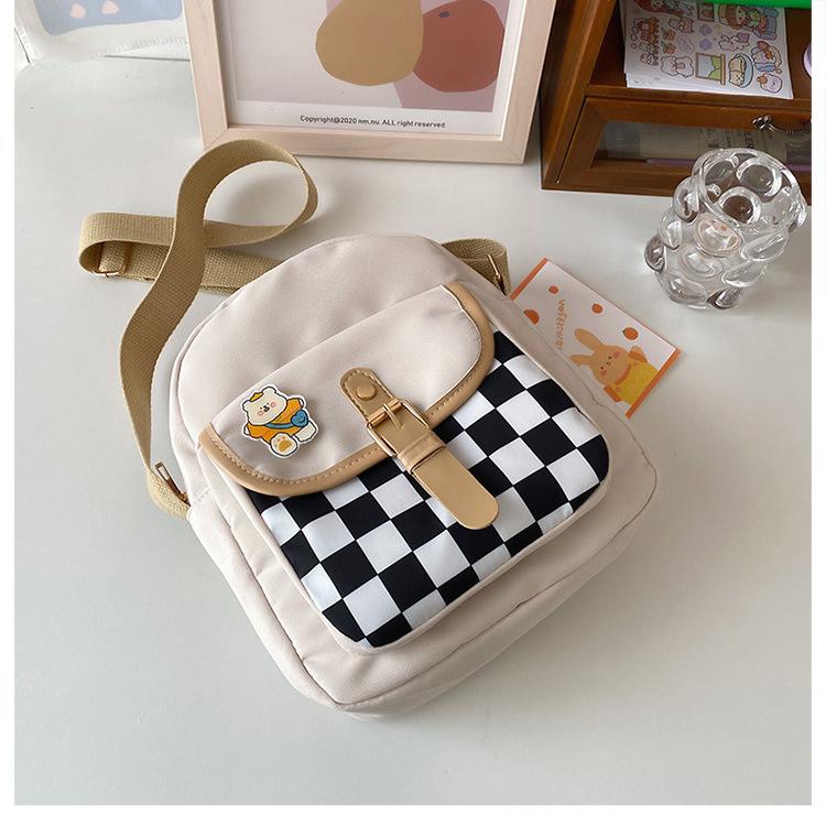 

Супер пожарная нейлоновая сумка с шахматной сеткой для женщин 2024 года, новая корейская версия, ретро, универсальная повседневная сумка-мессенджер, студенческий рюкзак чёрный