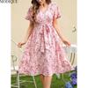 MODIQUE 2025 Summer New Women's Elegant Floral Print Belt Pleated Flounce Long Dress Ladies Casual A-Line Short Sleeve V-Neck Dress