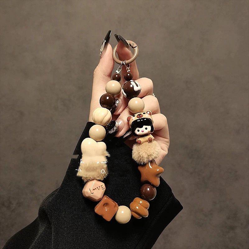 

Niche Design Mixed Beads Handmade Beaded Bracelet Phone Lanyard with Clip Keychain Universal for Women 639 3D Girl Brown Star Pendan