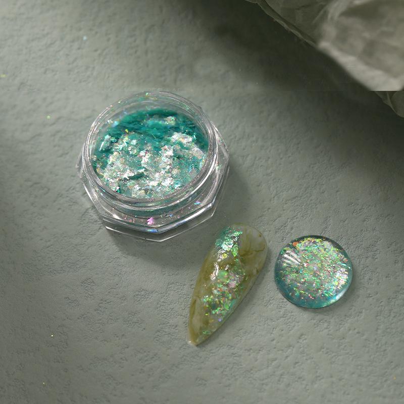 

Отбеливающая пудра Юнь Цзинь: Радужный летний гель для нейл-арта с фантазийным опаловым омбре-градиентом.