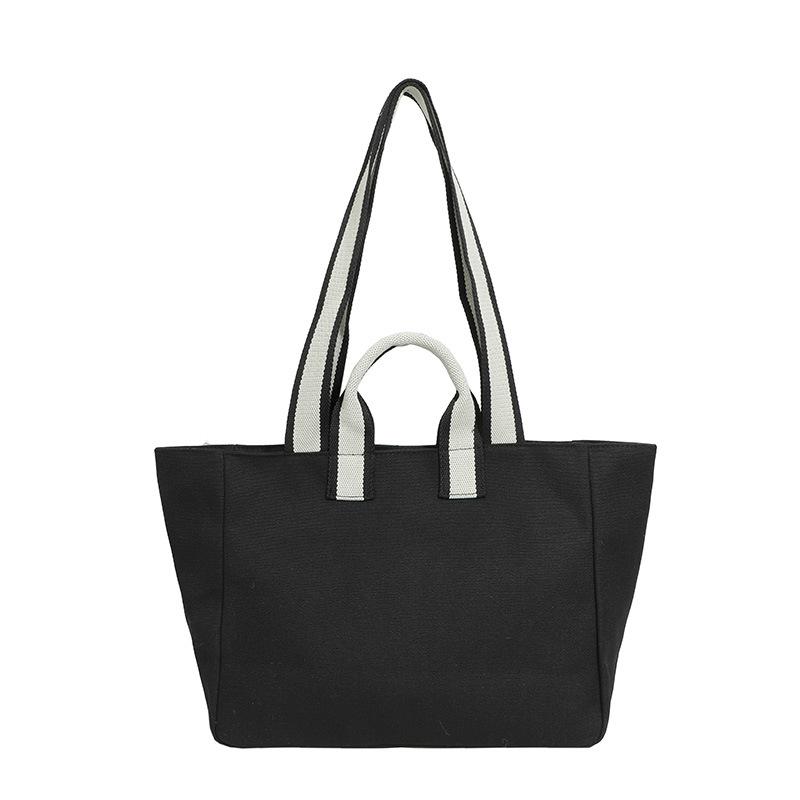 Shoulder bag women's 2025 autumn new trend large-capacity tote bag fashion simple college style commuter canvas bag