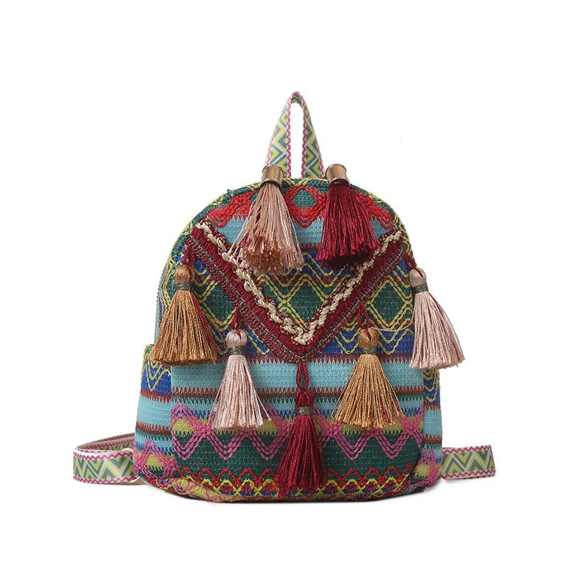 

Spring and summer new tassel color woven ethnic tourism vacation beach bag women s versatile double shoulder backpack синий