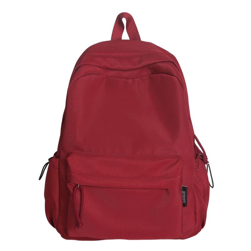 

Студенческий школьный рюкзак Женский рюкзак большой вместимости Мужской однотонный рюкзак красный