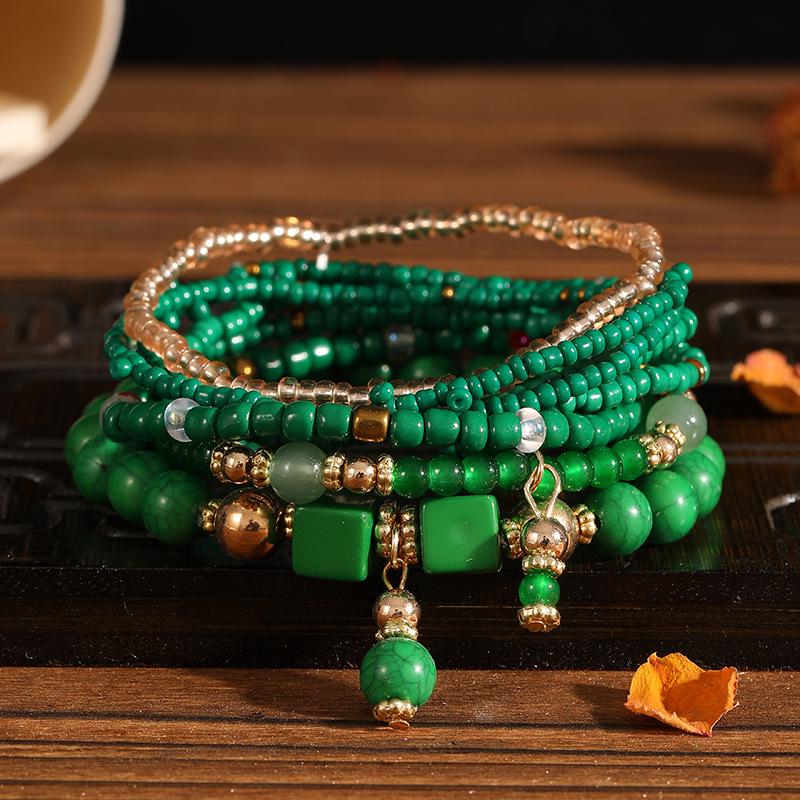 Böhmisches mehrlagiges elastisches Armband-Set: 8 Stränge kreativer Reiskornschmuck