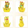 Decorative Showpiece –Feng Shui Cat Sitting On Money Ingots |Golden Waving Hand Cat |Symbol of Good Luck, Wealth, Health & Happiness