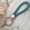Gevlochten Lederen Touw Sleutelhanger met Poppenhanger - Modieus en Creatief Accessoire