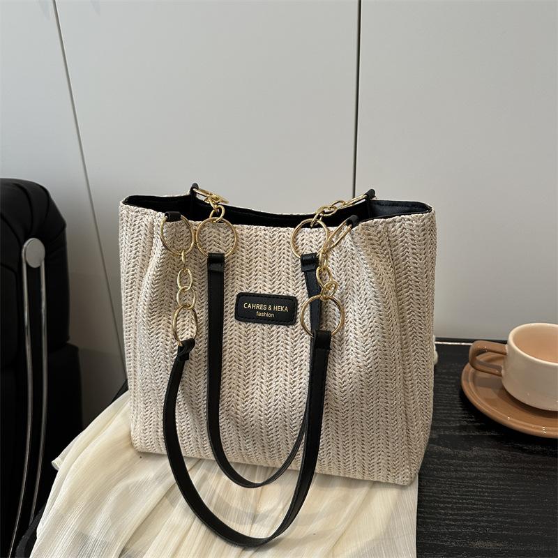 

Летняя плетеная соломенная сумка большой вместимости для женщин 2025 года, новая нишевая универсальная плетеная сумка в иностранном стиле, сумка через плечо