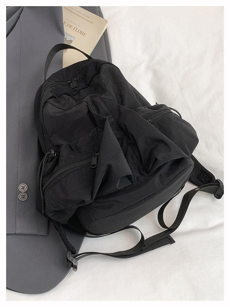 

2025 Новый Рюкзак Большой Вместимости Легкий Универсальный Дорожный Рюкзак для Отдыха Школьный Рюкзак для Студентов Рюкзак Школьный Студенческий Рюкзак Тренд чёрный