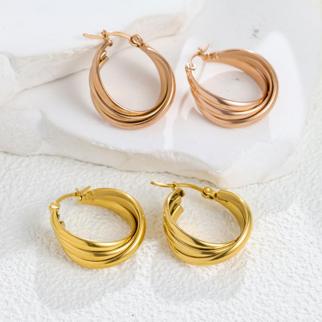 Simple niche design spiral twist metal small circle earrings personalized simple tide titanium steel earrings