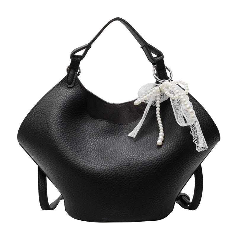 This year, the Korean version of the simple lychee pattern portable mother and child bag is popular, high-end, lightweight and versatile fashion mess
