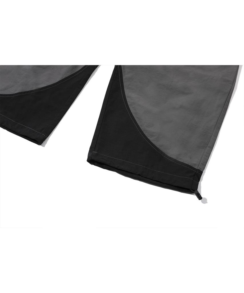 CPGN STUDIO Round Cut Dart Nylon Pants Black
