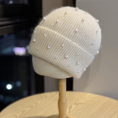Nouveau Chapeau en Laine Doux et Mignon Perle Automne Hiver Montrant le Visage Petit Tricoté Preuve du Froid Chapeau Baotou Chapeau Photo