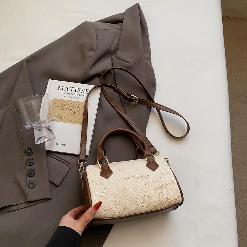 

Embossed Handbag Boston Bag Women 2025 New Korean Style Versitile Fashion Messenger Bag High Sense Pillow Bag White with coffee without pendant