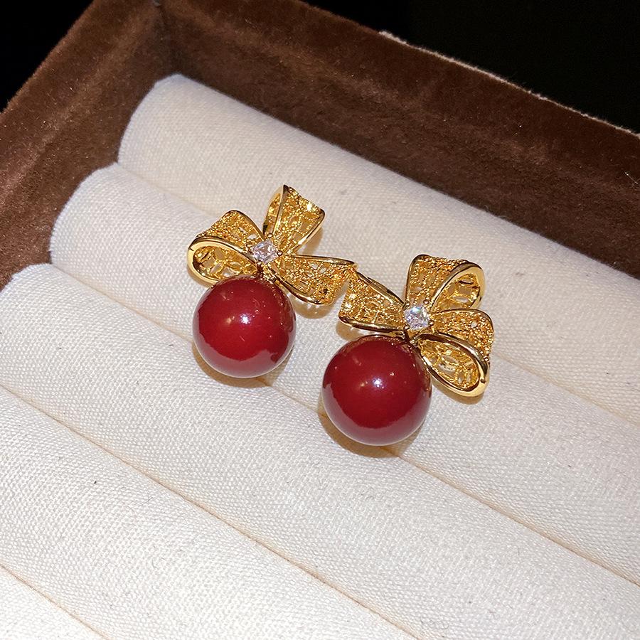 

Autumn and winter retro silver needle glass butterfly stud earrings sweet small fresh temperament earrings niche high-end earrings