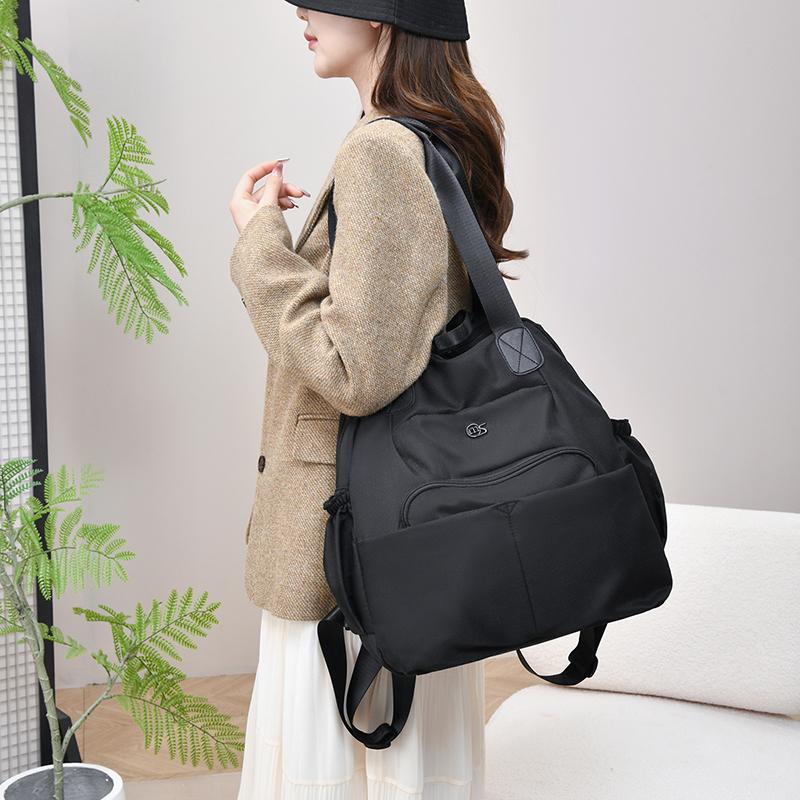 Fashionable Lightweight Backpack with Multiple Carrying Styles and Spacious Compartments for Daily Use