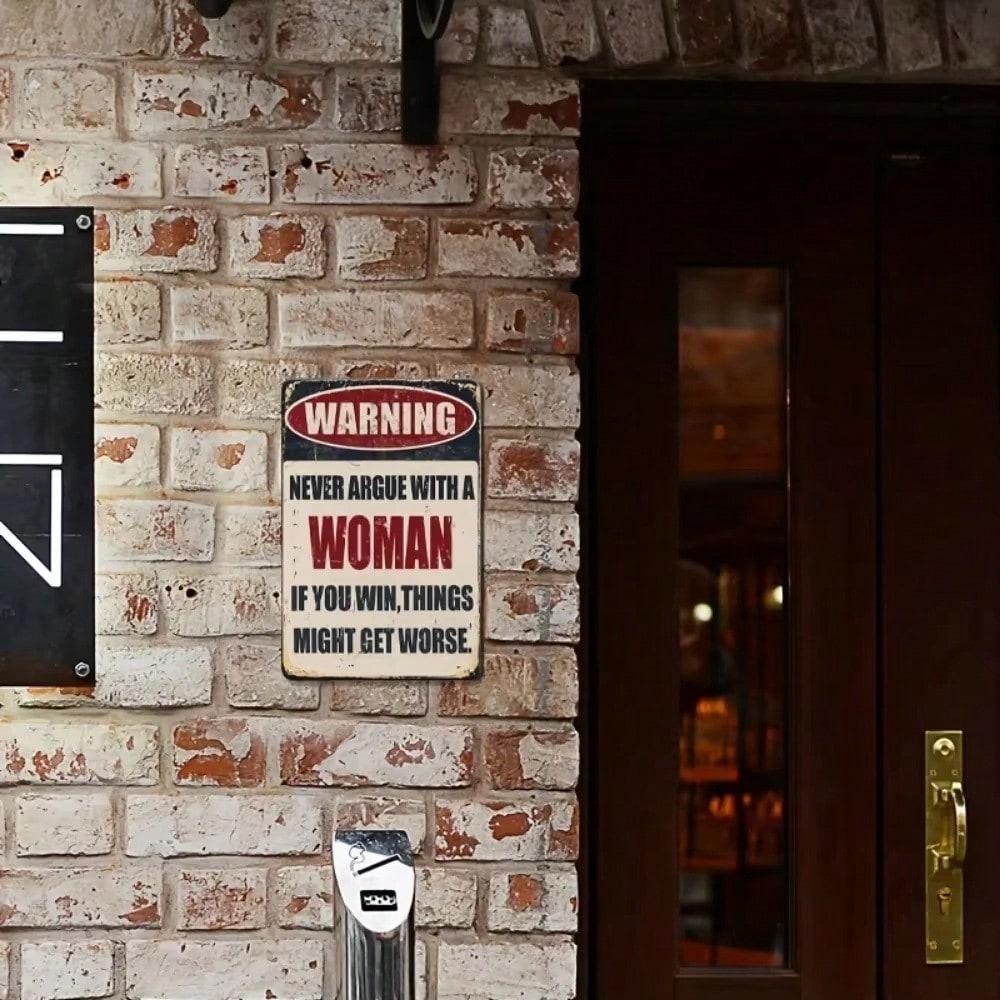"Never Argue With A Woman" Funny Metal Plaque – Vintage Wall Decor to Spice Up Garage, Bar, Pub & Home (Living/Bedroom/Kitchen)