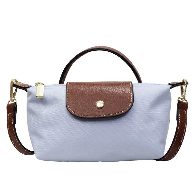 Sacs Nouveaux sacs en toile pour femmes Été léger luxe discret niche navetteur premium sacs bandoulière messager