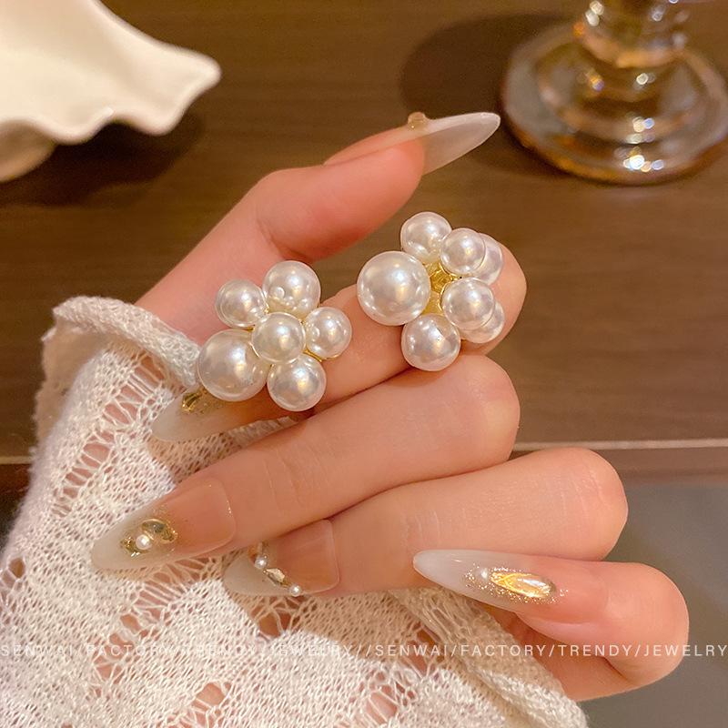 French retro flowering pearl earrings women s unique niche new stud earrings personalized earrings