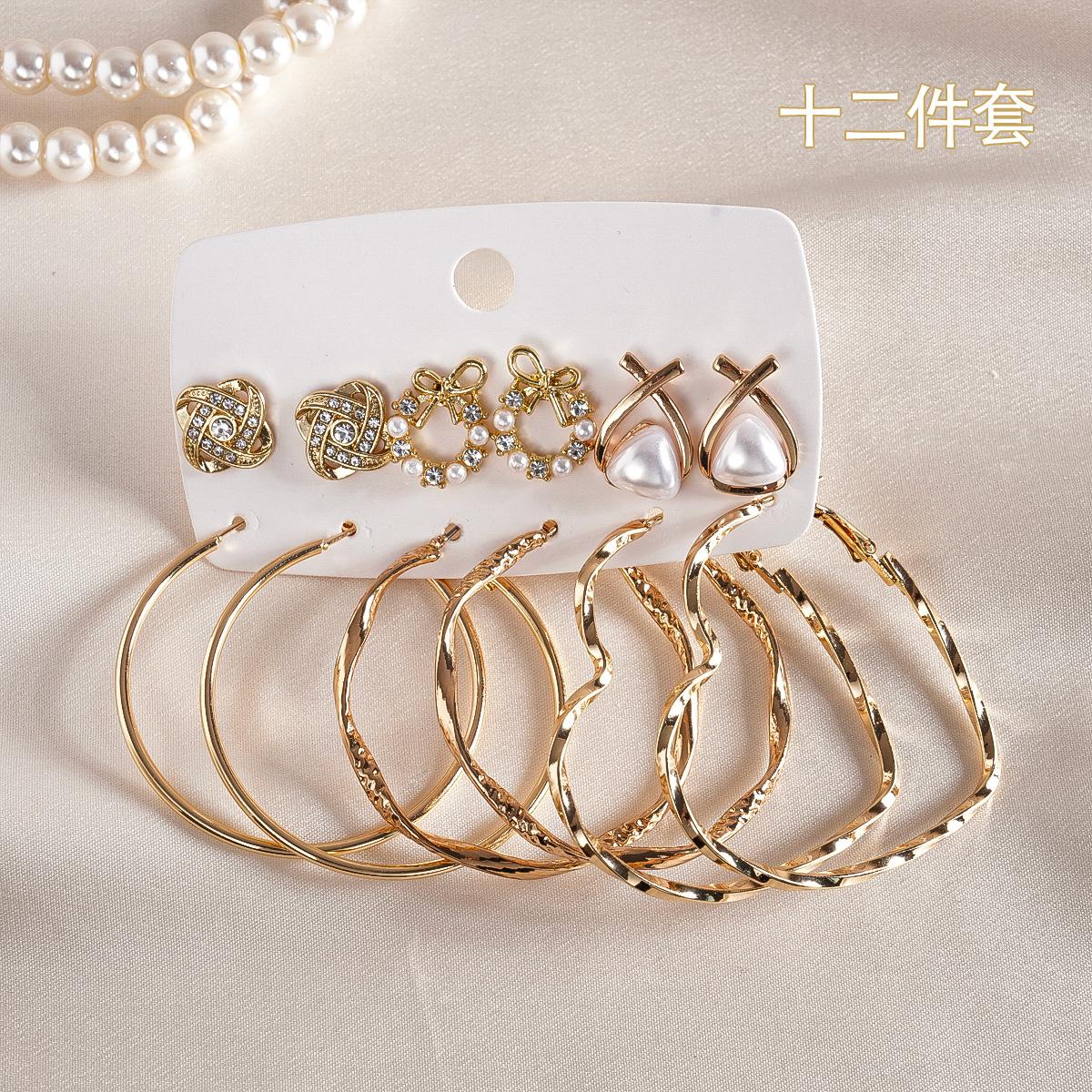 

Twelve-piece set of diamond-set imitation pearl geometric round love cross silver needle earrings light luxury earrings