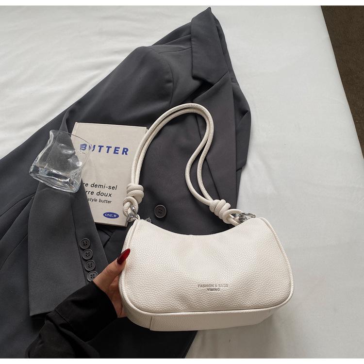 Fashion pleated portable women's bag 2025 summer new fashion shoulder bag simple foreign niche design messenger bag