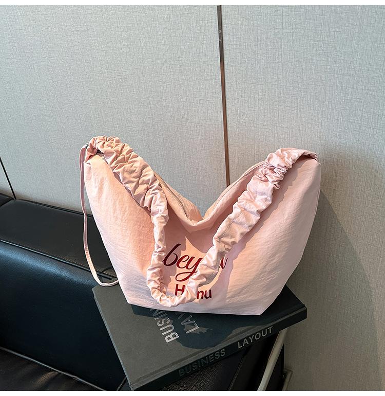 

Casual solid color canvas bag women s high-end sense large-capacity tote bag pleated commuter women s hand-held underarm bag рожевий