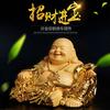 Hotei, one of the Seven Lucky Gods, is a gold-colored Buddhist figurine perfect for warding off evil, bringing good fortune, and bringing good luck. T