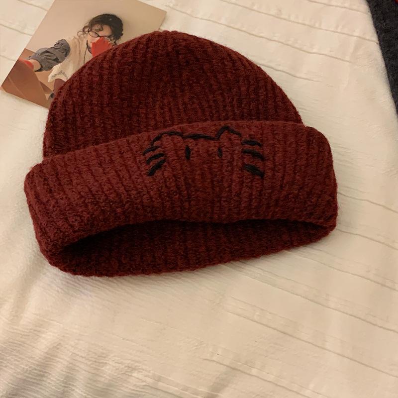 Cute cat embroidery blue knitted women's new sweet and versatile face small warm ear protector wool hat