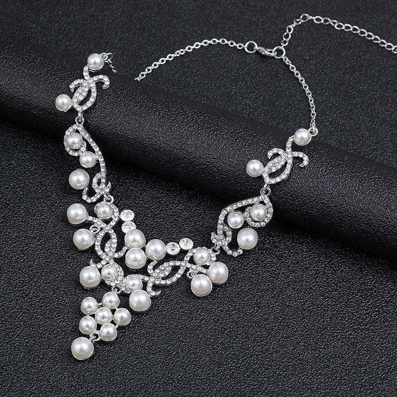 European and American pearl necklace earrings set women's fashion temperament explosive alloy water drop flower bridal dress personality