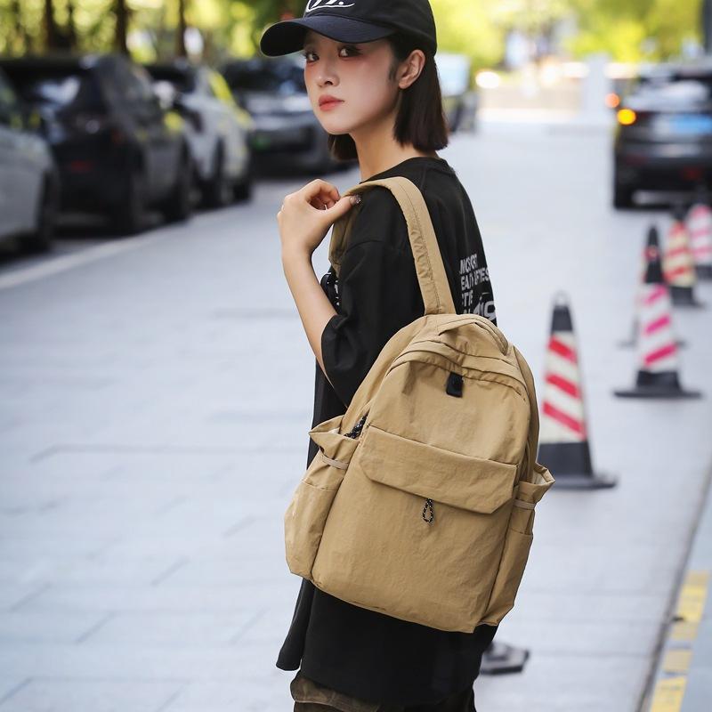 Schoolbag Japanese ins solid color backpack men's and women's large-capacity schoolbag simple and lightweight waterproof versatile casual backpack