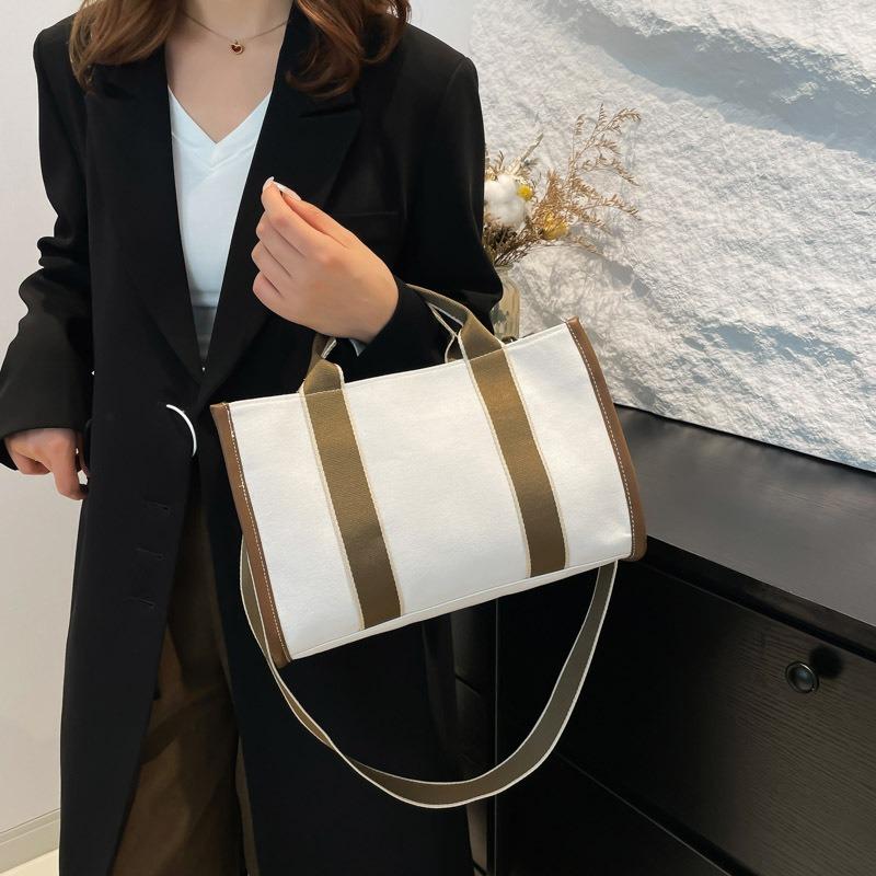 Spring new fashion, large-capacity portable canvas bag commuter shoulder bag contrasting colors