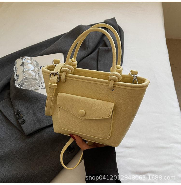 

Niche fashion hand-carried bucket bag women s 2025 spring new Korean version simple trend casual shoulder messenger bag жовтий