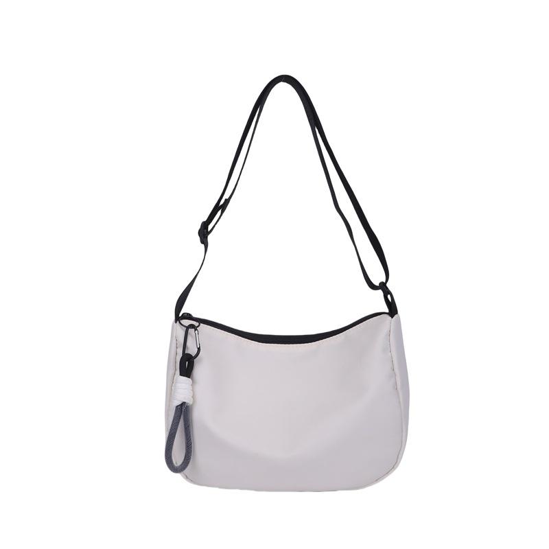 Fashion texture retro niche bag new women s bag popular versatile shoulder underarm bag handbag . белый