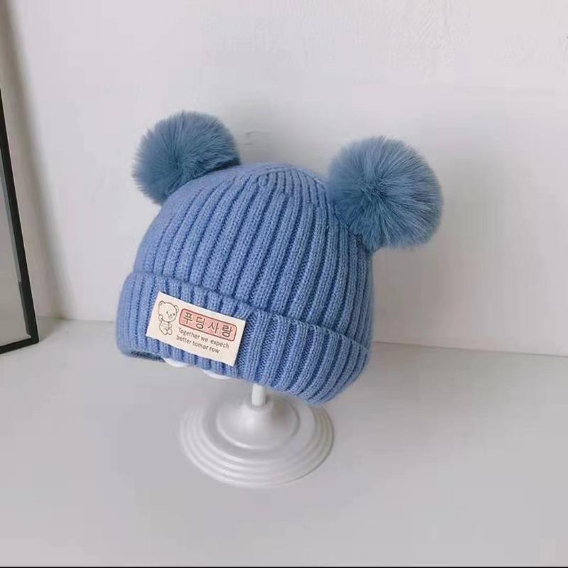 Baby autumn and winter cute cartoon warm hairball wool hat boys and girls baby ear protection hat children pullover knitted hat