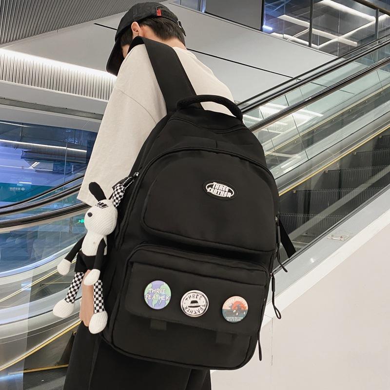 

School bag junior high school students high value simple backpack male high school college students wind large capacity burden reduction backpack чорний
