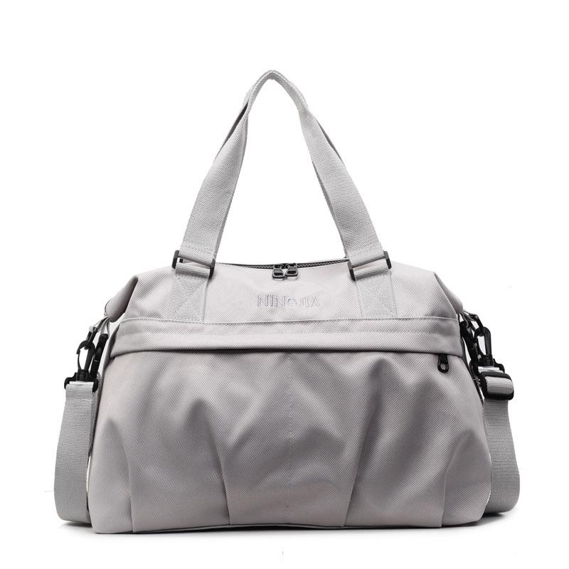 Travel bag Large capacity Premium sense leisure shoulder bag Business trip boarding Airplane storage Luggage bag Fitness sports bag