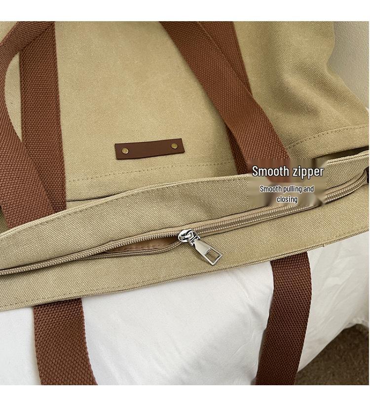 2025 Large Capacity Canvas Travel Handbag - Versatile Single Shoulder Bag for Commute, Casual Shopping, and Fashion.