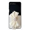 Pouzdro na telefon s mašlí Camellia pro Samsung Zflip7 Flip Fold Findn3Flip Kožené Dámská Móda